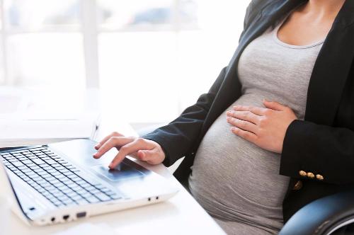 Expectant mother using technology